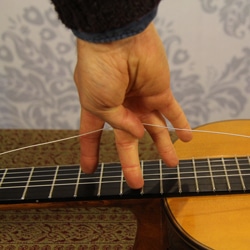 slack in guitar string