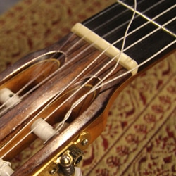 knot the string in the hole