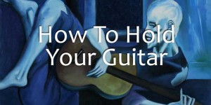 How To Hold a Guitar